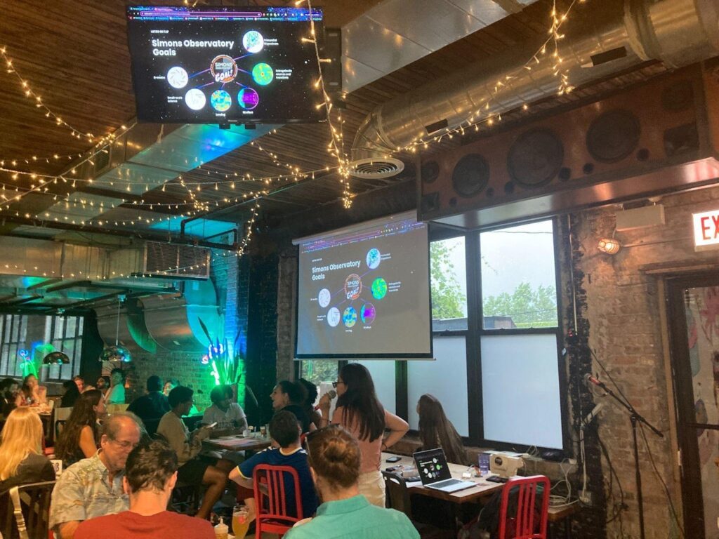 Karen Perez Sarmiento talking about the science goals of Simons Observatory during an Astronomy on Tap event in conjunction with our 2024 collaboration meeting in Chicago