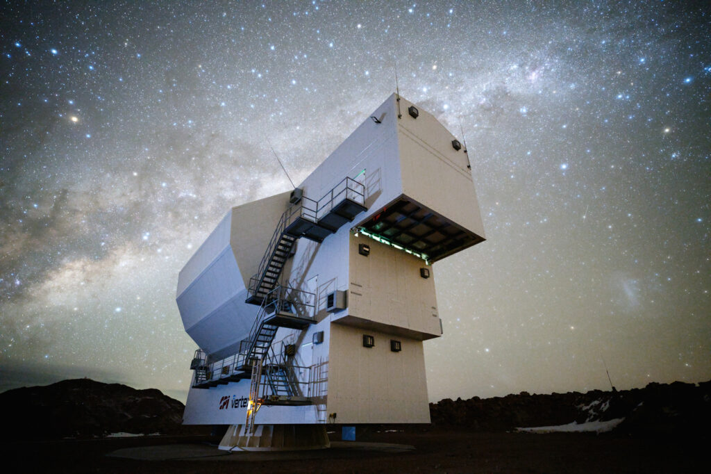 the Simons Observatory Large Aperture Telescope at night with the Galaxy behind it
